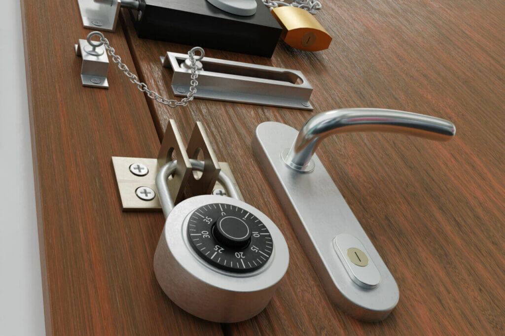 A wooden door with various security mechanisms, including a door handle, deadbolt lock, combination lock, chain lock, latch lock, and padlock. The door appears heavily secured with multiple layers of locking devices that would impress any locksmith.