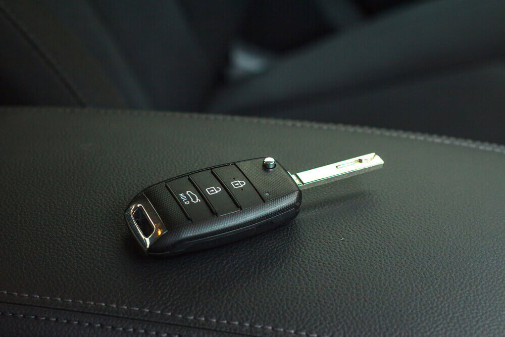 8 Reasons Why Your Car Key Fob Is Not Working A Key Fob Laid On Car Interior