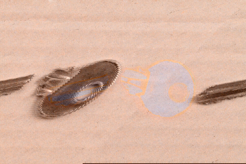 Broken Key Lying On A Surface