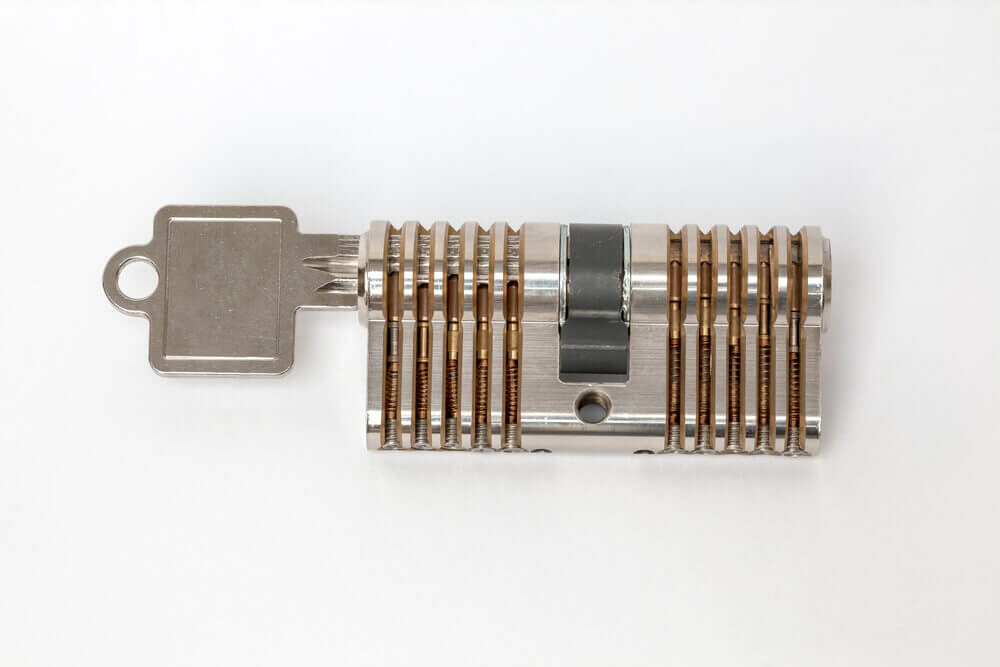 Lock Cylinder Lying On Surface With Pins Visible