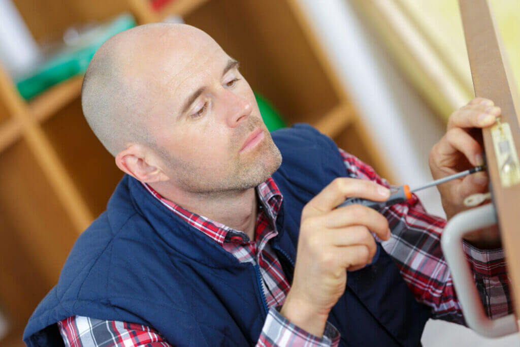 Man Opening Lock 1024x683